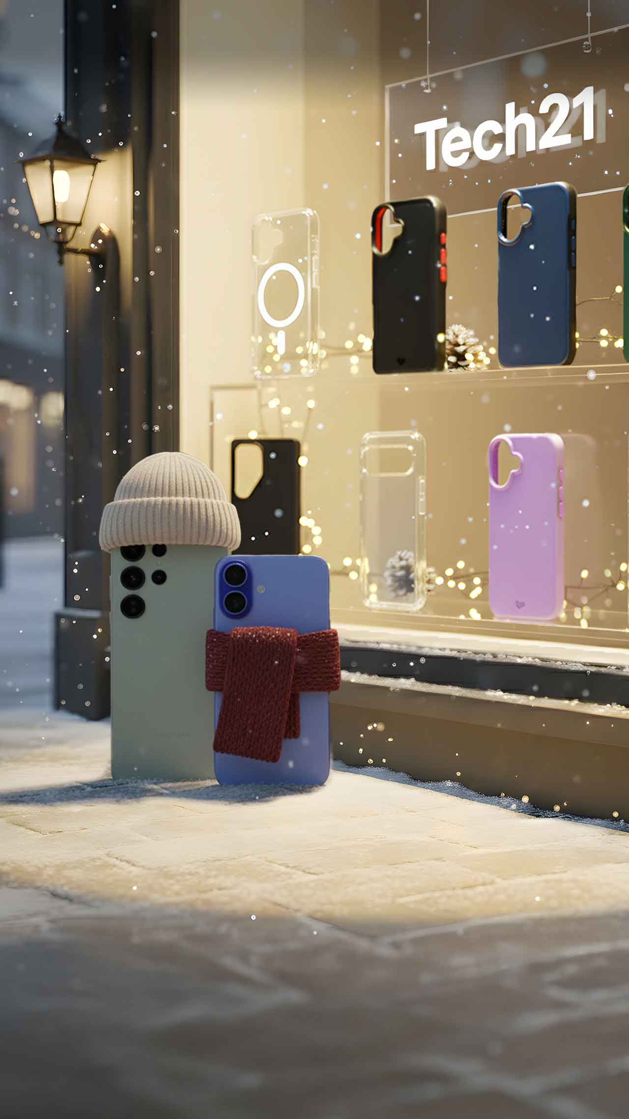 A Samsung S25 and iPhone 17 stand bundled up in knit hat and scarf out in the snow on a street corner looking into a store window with Tech21 cases. Text in the window reads Tech21.